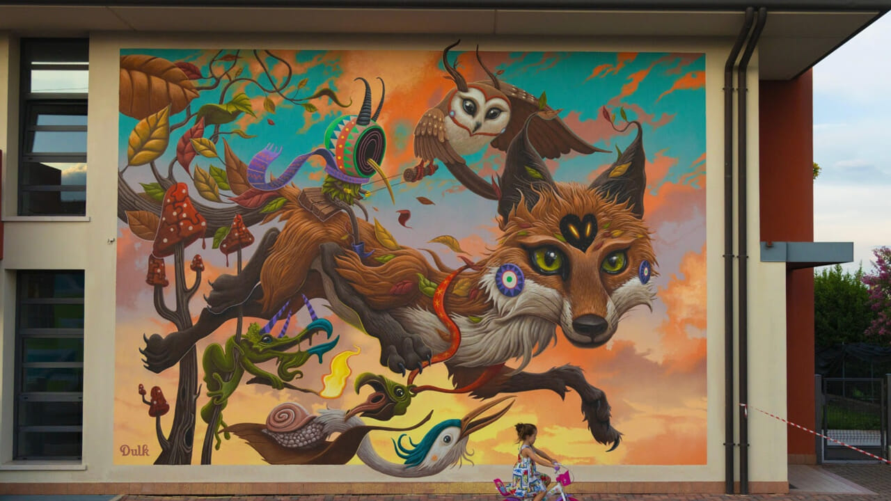 BIODIVERSITÀ E MIGRAZIONI, L’OPERA DI DULK A THE WALLÀ. LA STREET ART INTERNAZIONALE PROTAGONISTA NEL BORGO VENETO 